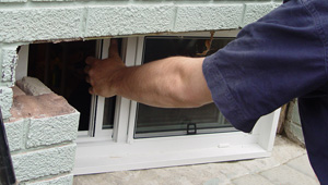 Installing new windows in a Henderson finished basement