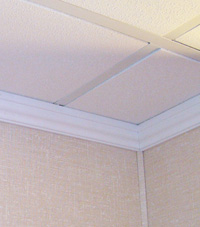 Crown molding for a basement wall/ceiling joint