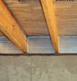 SilverGlo™ insulation installed in a floor joist in Cynthiana