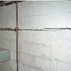 Severe foundation damage from a long crack in a bucking wall of a Spottsville home.
