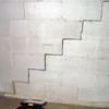 A diagonal stair step crack along the foundation wall of a Brandenburg home