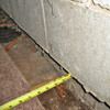 Foundation wall separating from the floor in Philpot home