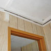 The ceiling and wall separating as the wall sinks with the slab floor in a Brandenburg home