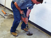 Coring the concrete of a concrete slab floor in Cynthiana