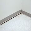 A partition wall separating from the floor in a Marion home.