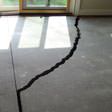 a huge crack in a concrete slab floor in Newburgh
