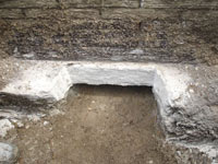 Preparing a foundation footing for helical pier installation in Madisonville
