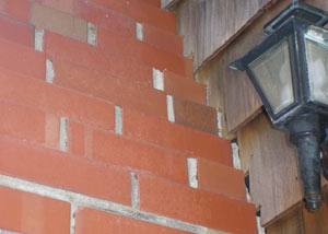 a repaired chimney in Vine Grove that had shown serious foundation damage and was repaired with a helical pier system.