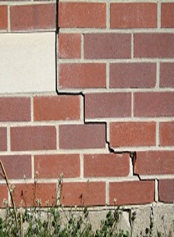 photo of a rotating foundation wall with cracks in Hardinsburg