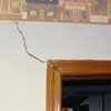 A large settlement crack on interior drywall in a Central City home.