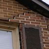 Stair step cracking starting at a window in a Philpot home