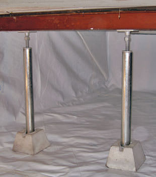 Crawl space jack posts installed in conjunction with a crawl space vapor barrier in Hardinsburg
