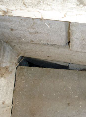 inward rotation of a foundation wall damaged by street creep in a garage in Petersburg