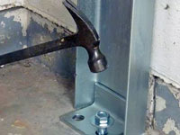 Mounting a foundation channel anchor installation to the floor in Jasper.