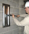 Tightening a wall anchor plate in Vincennes, Indiana and Kentucky