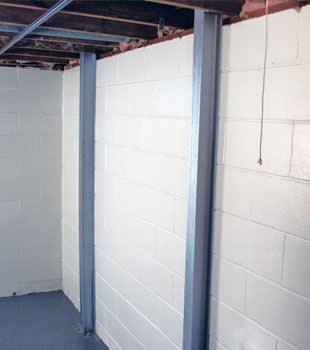 A PowerBrace™ i-beam foundation wall repair system in Evansville