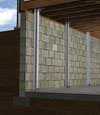 I-beam foundation wall supports installed in a Oakland City basement.