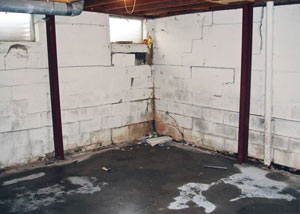 A failed, rusty i-beam foundation wall system installed in Hardinsburg.