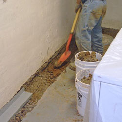 Digging a trench for a French Drain system in Evansville