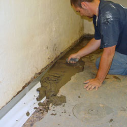 Testing a French drain system in a Fort Knox home.