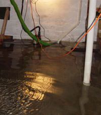 Several feet of floodwaters in a Oakland City basement
