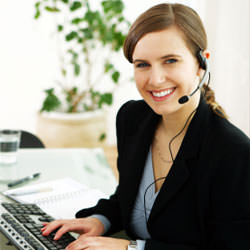 A disaster restoration customer service expert in Vincennes manning the phones