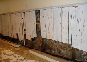 A wet, flooded finished basement in Morganfield