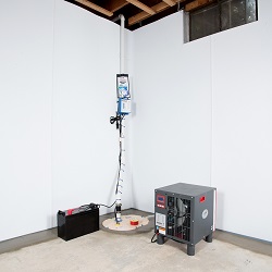 Sump pump system, dehumidifier, and basement wall panels installed during a sump pump installation in Spottsville