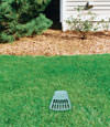 A buried gutter drain downspout extension installed in a Rockport home