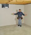 Jasper basement insulation covered by EverLast™ wall paneling, with SilverGlo™ insulation underneath